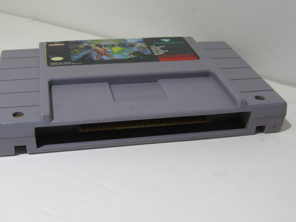Front view of Super Nintendo Battletoads & Double Dragon cartridge with artwork, showing title and gaming details.