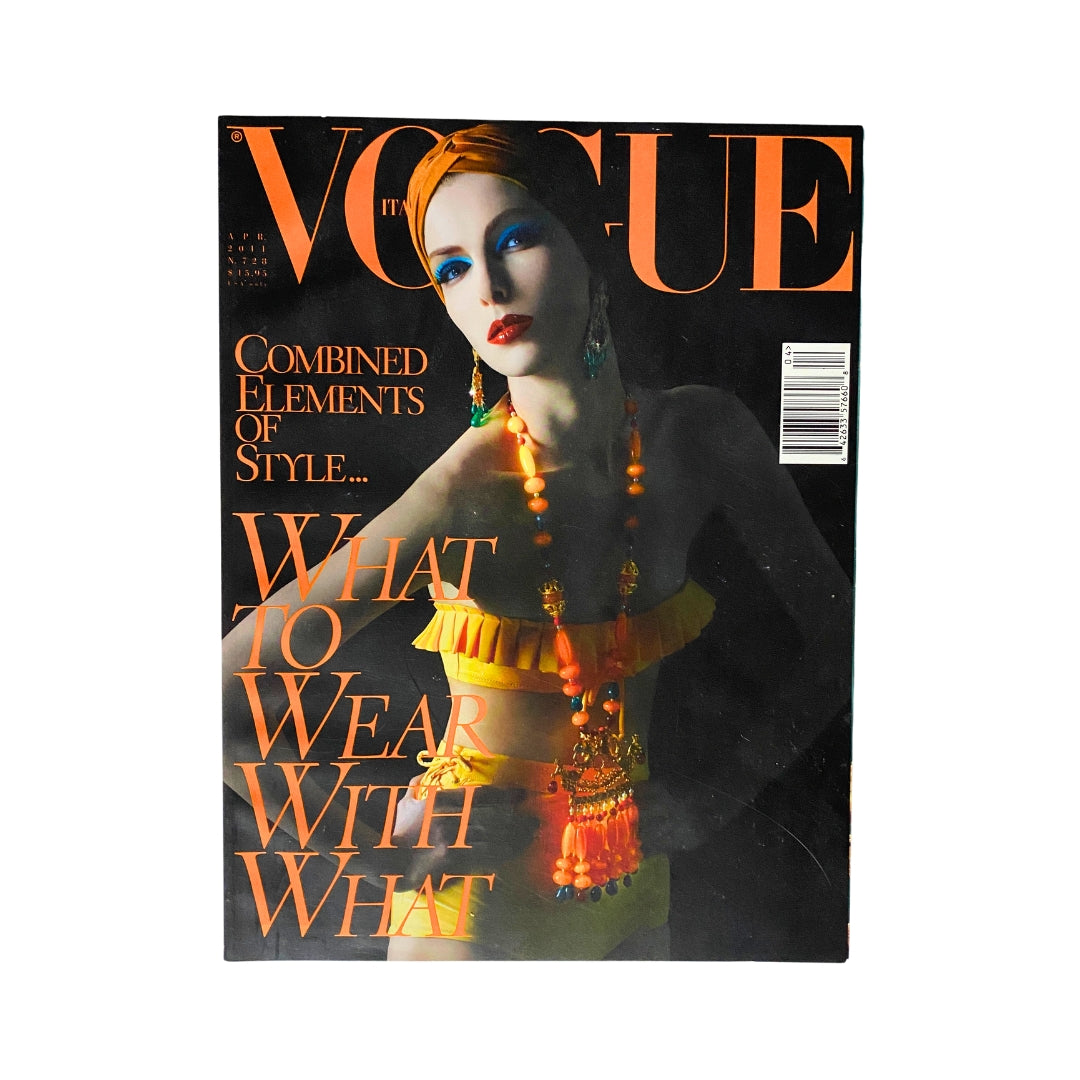 Cover of Vogue Italia Magazine April 2011 featuring Kristina Salinovic in a bold yellow outfit and striking photography, showcasing the theme 'What to Wear With What'.