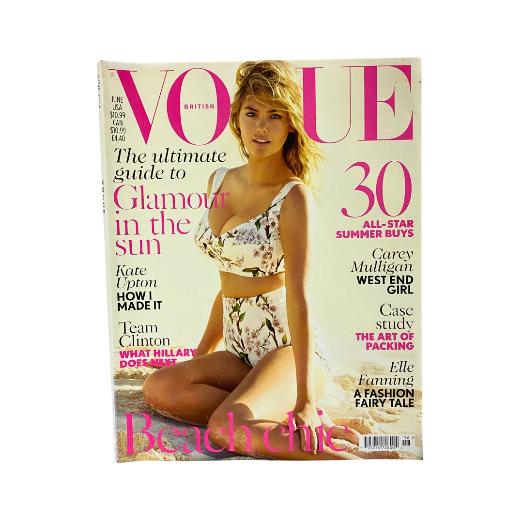 Vogue UK Magazine June 2014 Kate Upton Cover featuring floral swimwear, showcasing summer fashion trends and beauty tips.