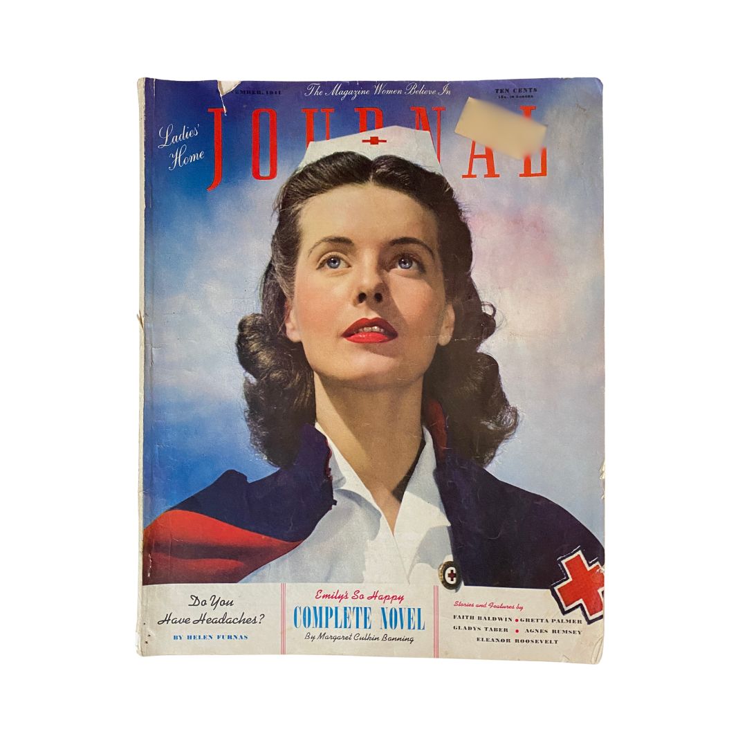 VTG The Ladies Home Journal September 1941 Diary of Domesticity cover featuring a woman in a nurse's hat looking upward, showcasing vintage magazine design.