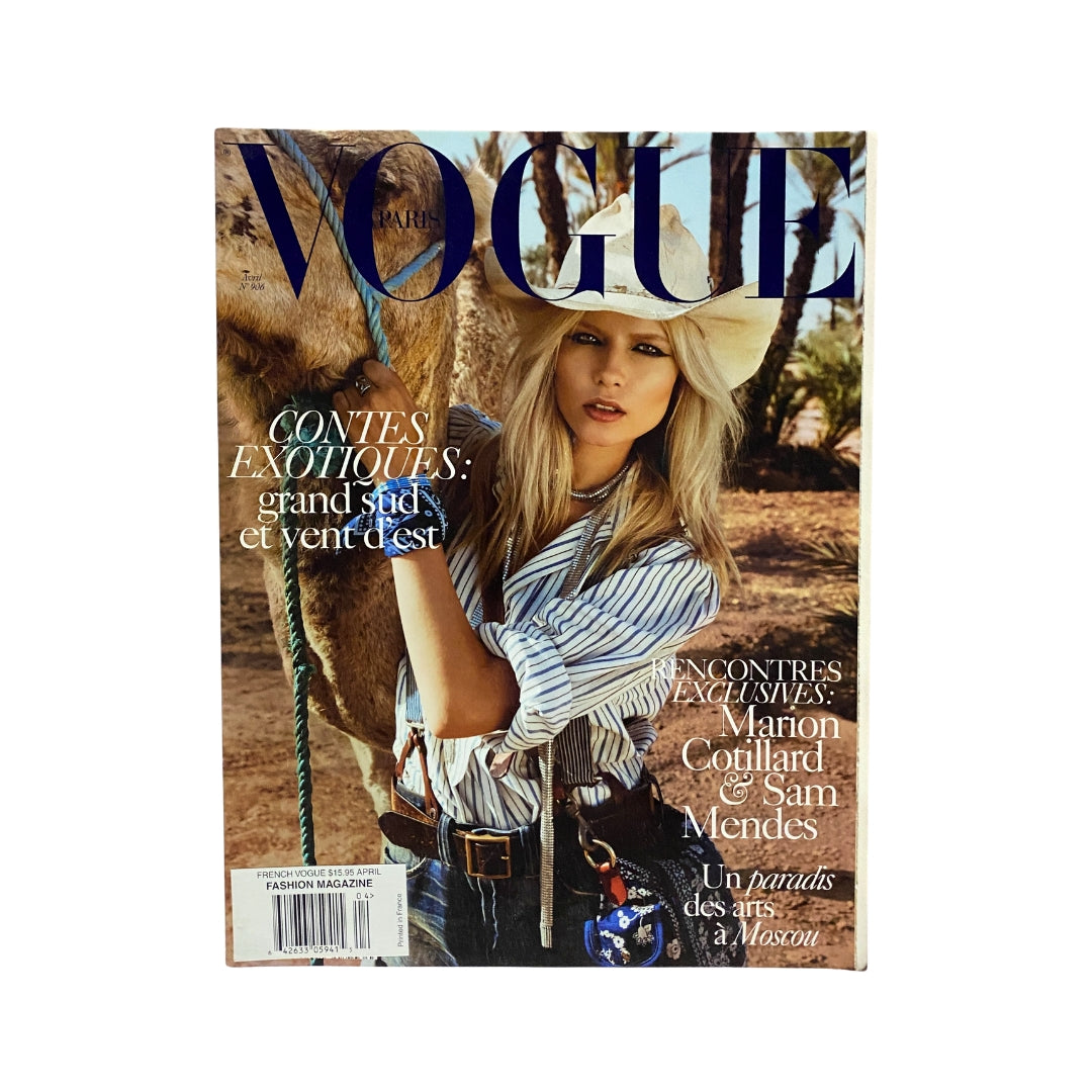 Vogue Paris Magazine April 2010 featuring supermodel Natasha Poly on the cover. This vintage magazine showcases iconic fashion photography and reflects the trends of the late 2000s, making it a valuable collectible for fashion enthusiasts.