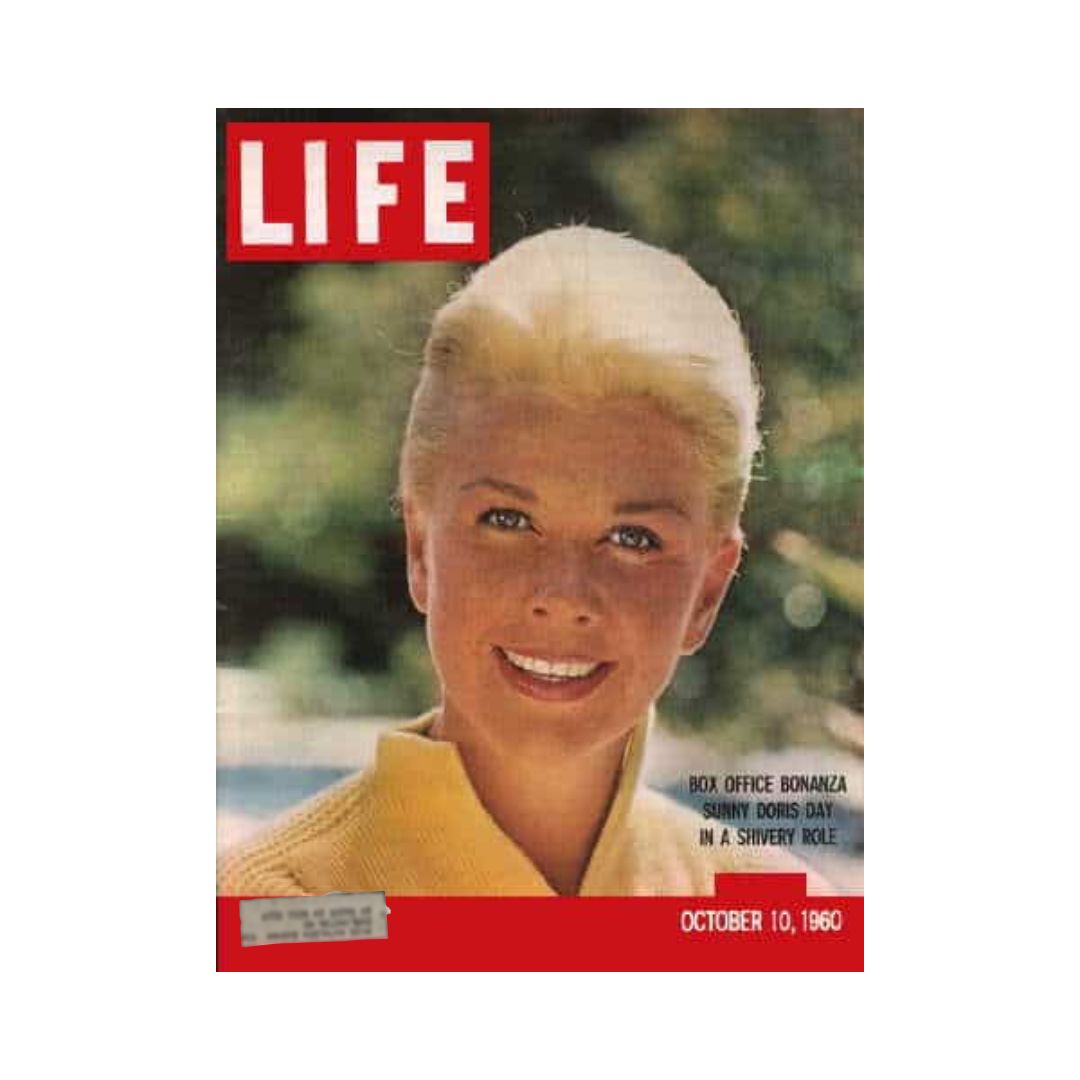 Cover of VTG Life Magazine from October 10, 1960, featuring Doris Day, showcasing her radiant smile and highlighting the cultural significance of the era.