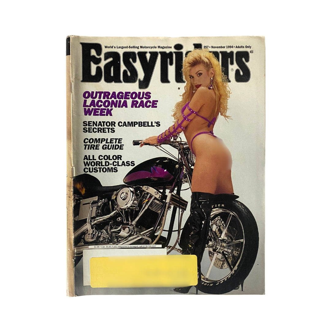 Easyriders Magazine November 1994 issue featuring Outrageous Laconia Race Week on the cover, showcasing a stunning custom motorcycle with a model in stylish attire. This collectible vintage magazine captures the vibrant motorcycle culture of the '90s.