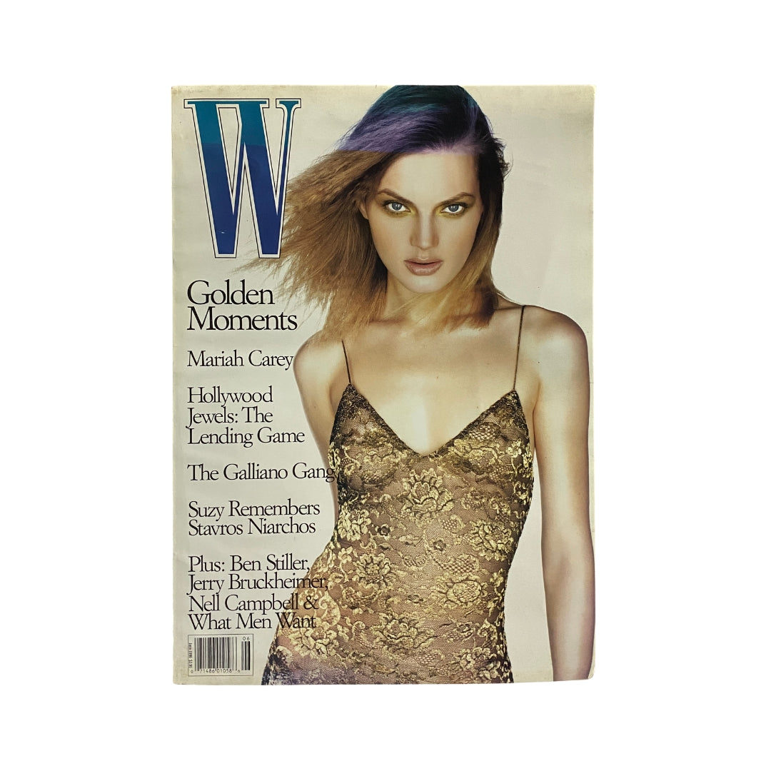 W Magazine June 1996 cover featuring model Guinevere Van Seenus in a golden dress, celebrating fashion and style of the 90s.