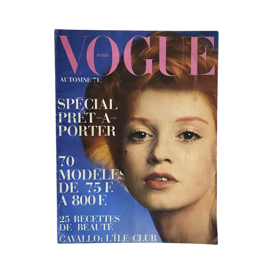 Cover of Vogue Paris Magazine August 1971 Special Pret A Porter, featuring a striking model with red hair and bold makeup, highlighting fashion styles of the 1970s.
