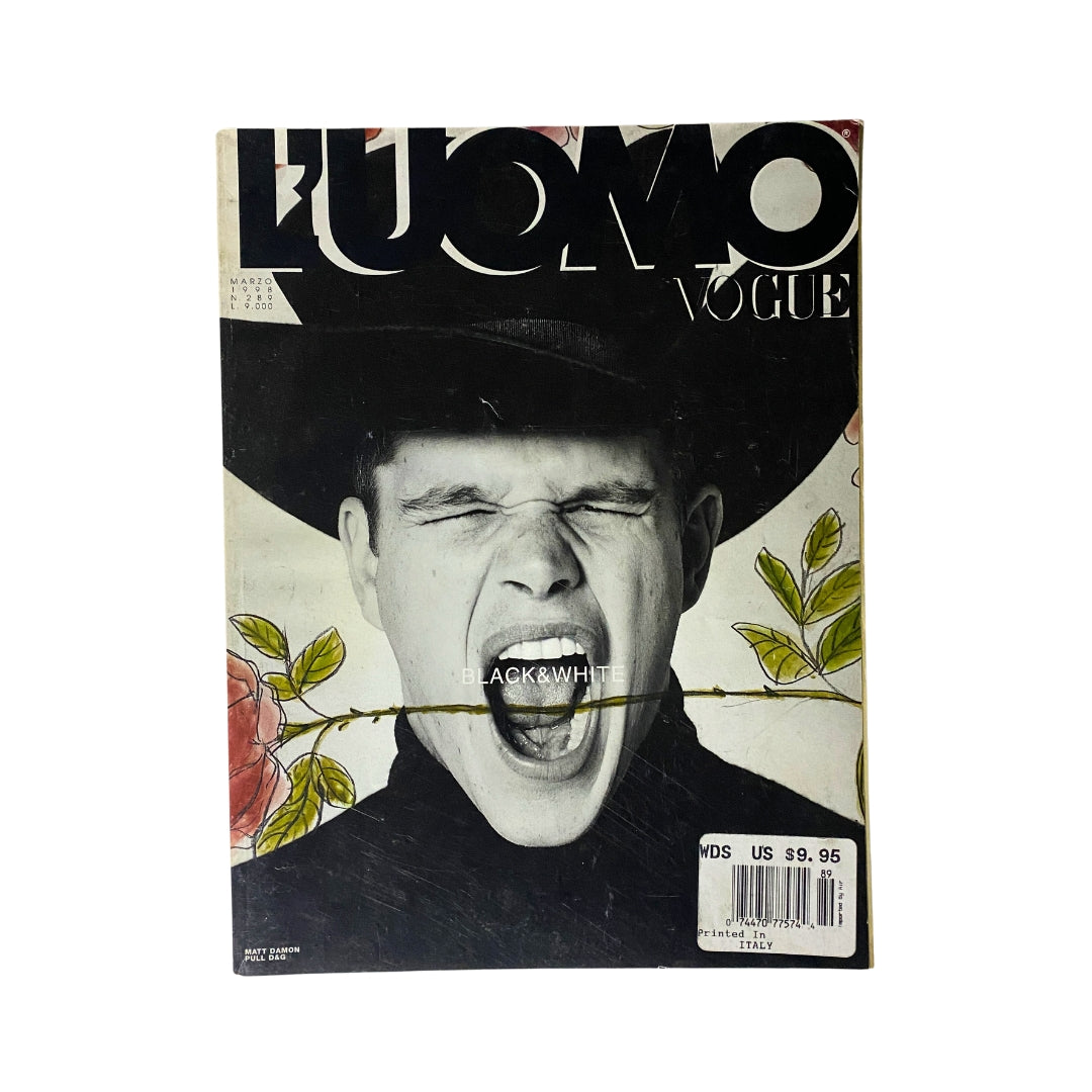 L'uomo Vogue Magazine March 1998 featuring Matt Damon on the cover, showcasing a black and white image with floral accents, in very good condition.