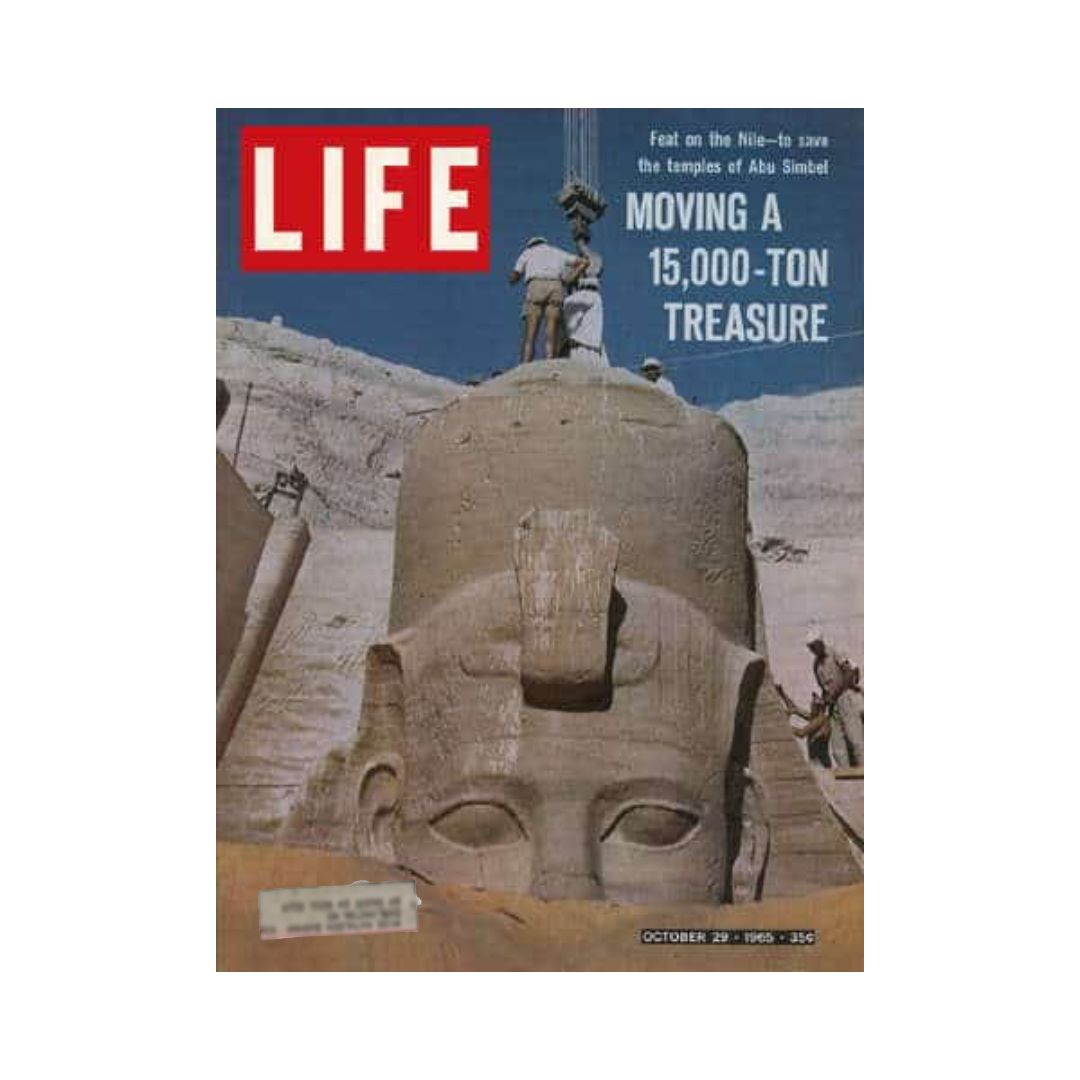 Cover of Life Magazine, October 29, 1965, featuring an article on Saving the Temple of Abu Simbel on the Nile, showcasing the monumental sculpture of a pharaoh amidst construction efforts to preserve this historic site.