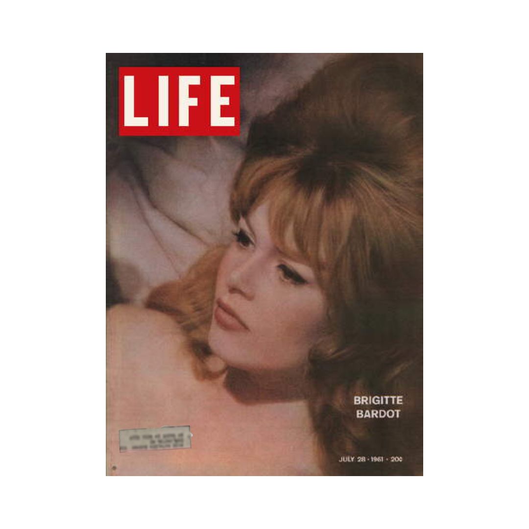 Cover of VTG Life Magazine from July 28, 1961 featuring Brigitte Bardot, showcasing her iconic beauty and style.