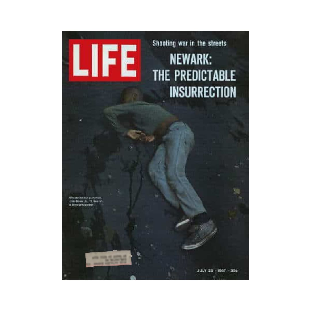 Cover of VTG Life Magazine dated July 28, 1967, featuring the title 'Shooting War in the Streets of Newark' with a powerful visual of a person in distress, capturing the social upheaval of the 1960s.