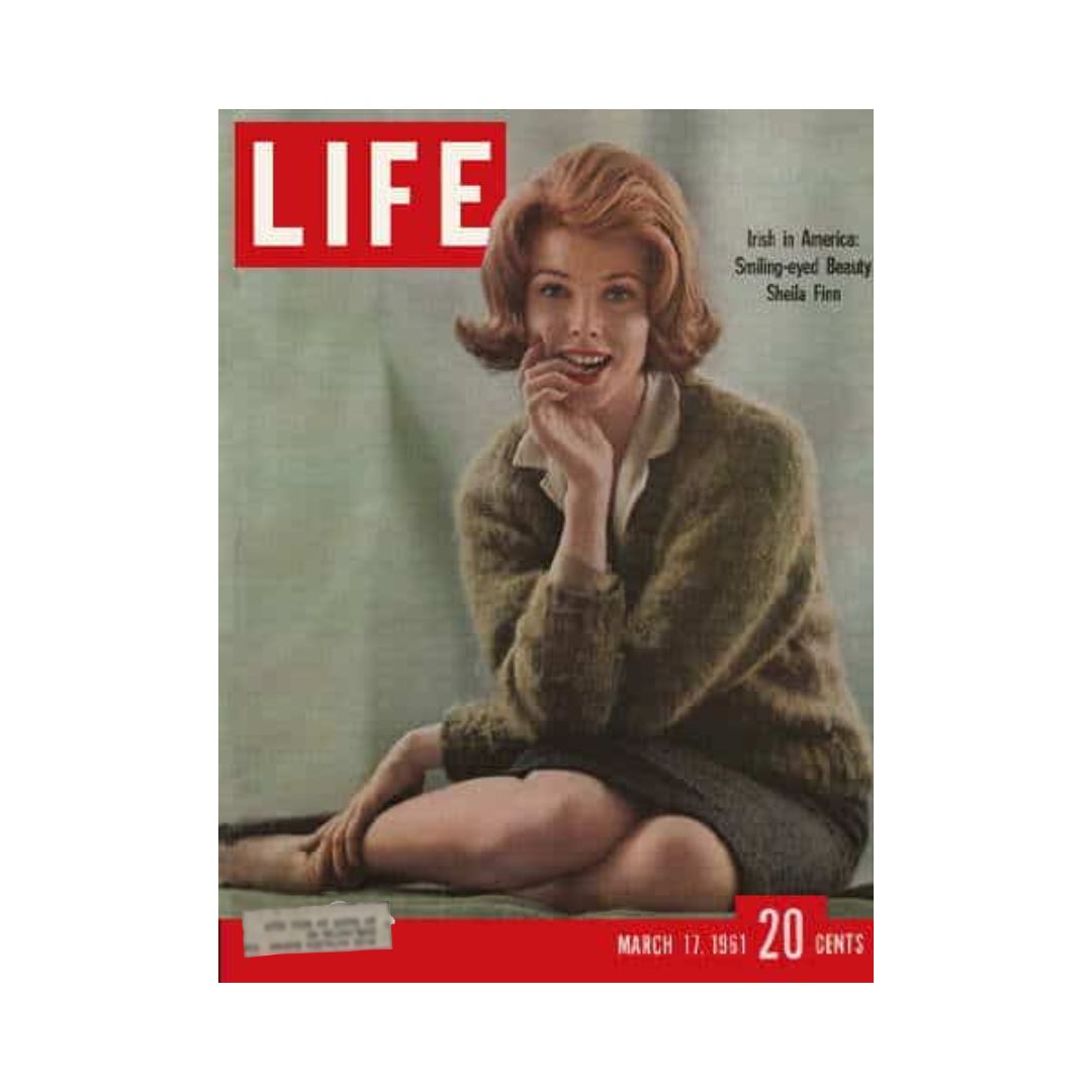 Vintage Life Magazine cover from March 17, 1961, featuring the article 'Irish in America: Smiling-eyed Beauty Sheila Finn.' The cover showcases a woman with red hair, smiling, wearing a green sweater and sitting comfortably.