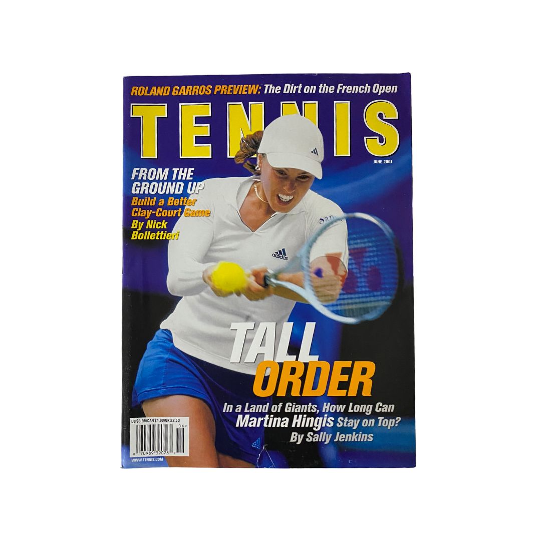 June 2001 Tennis Magazine featuring Swiss player Martina Hingis on the cover. The cover showcases Hingis competing with a tennis racket, embodying her athletic prowess.