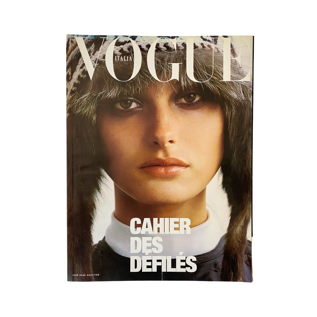 Cover of Vogue Italia Magazine July 1998 featuring striking fashion photography, headline 'Cahier des Défilés', highlighting Jean Paul Gaultier's iconic style.