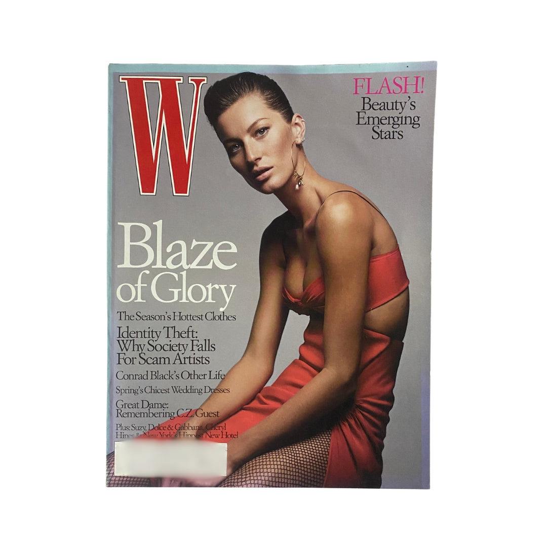 W Magazine January 2004 cover featuring Gisele Bündchen in a striking red dress, emphasizing her status as an iconic supermodel during the early 2000s fashion era.