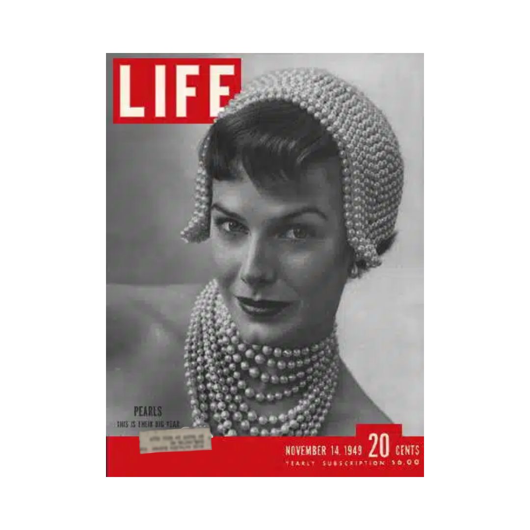 VTG Life Magazine from November 14, 1949 featuring an elegant model adorned with pearls, capturing the essence of pearls in fashion.