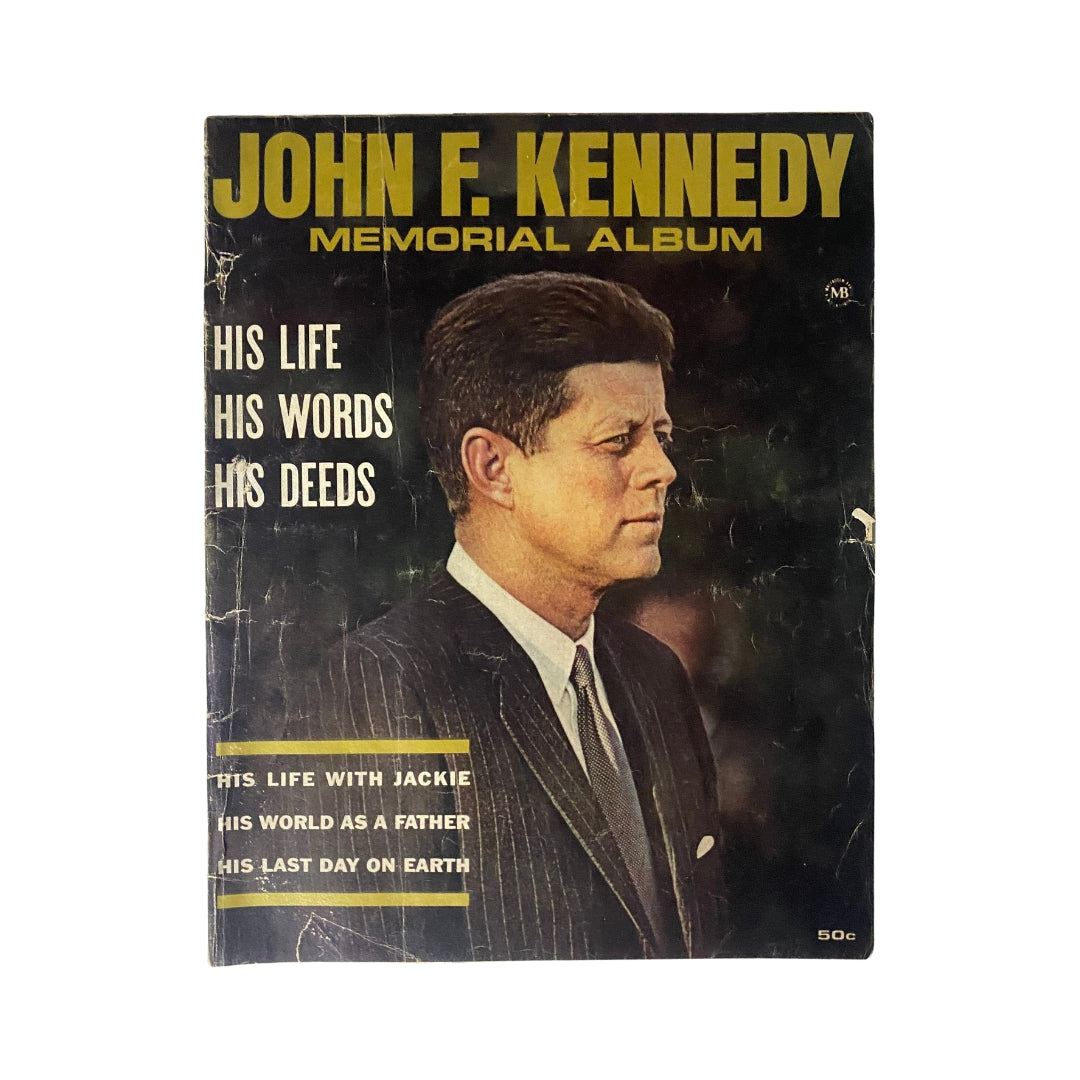 Cover of the VTG 1964 John F. Kennedy Memorial Album showcasing JFK's profile, featuring the title "John F. Kennedy Memorial Album - His Life, His Words, His Deeds." This collectible vintage magazine highlights Kennedy's life and legacy.