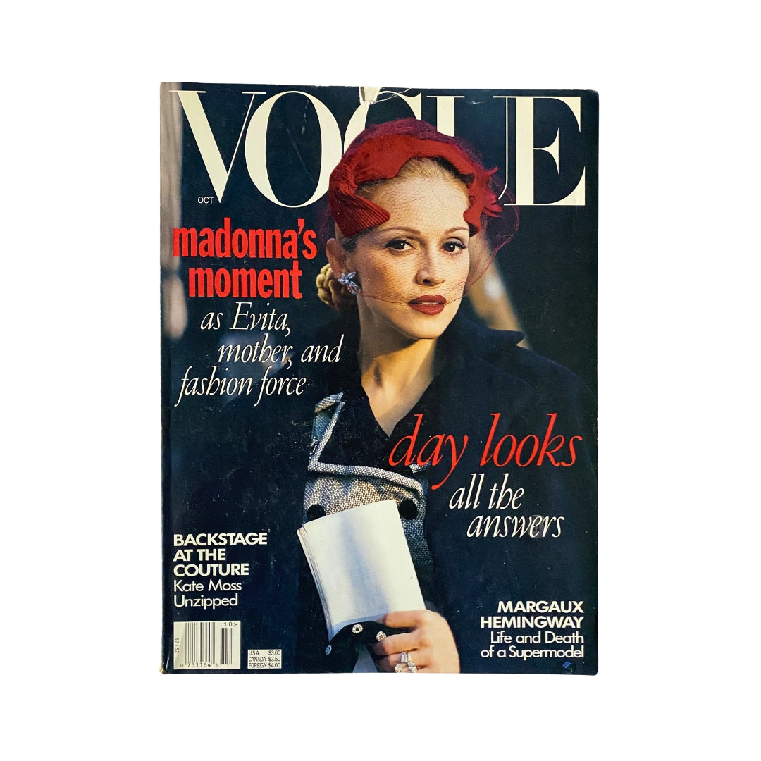 Vogue Magazine October 1996 cover featuring Madonna, highlighted as Evita, mother, and fashion force, displaying bold fashion statements.