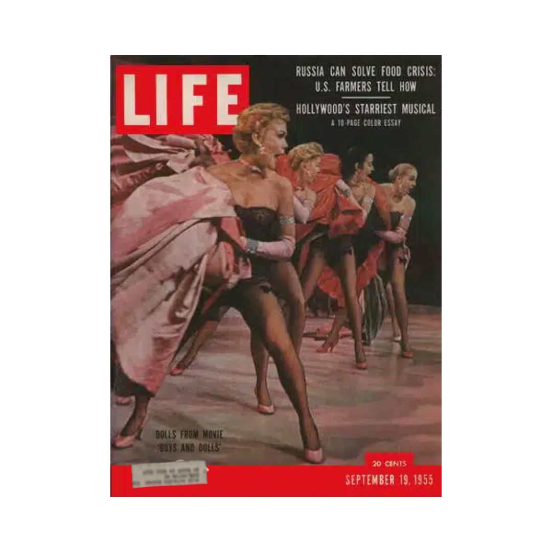 Vintage cover of Life Magazine from September 19, 1955, featuring a glamorous scene from the musical film Guys and Dolls, showcasing dancers in elegant costumes. This issue highlights Hollywood's star-studded musical and includes cultural insights from the mid-20th century.