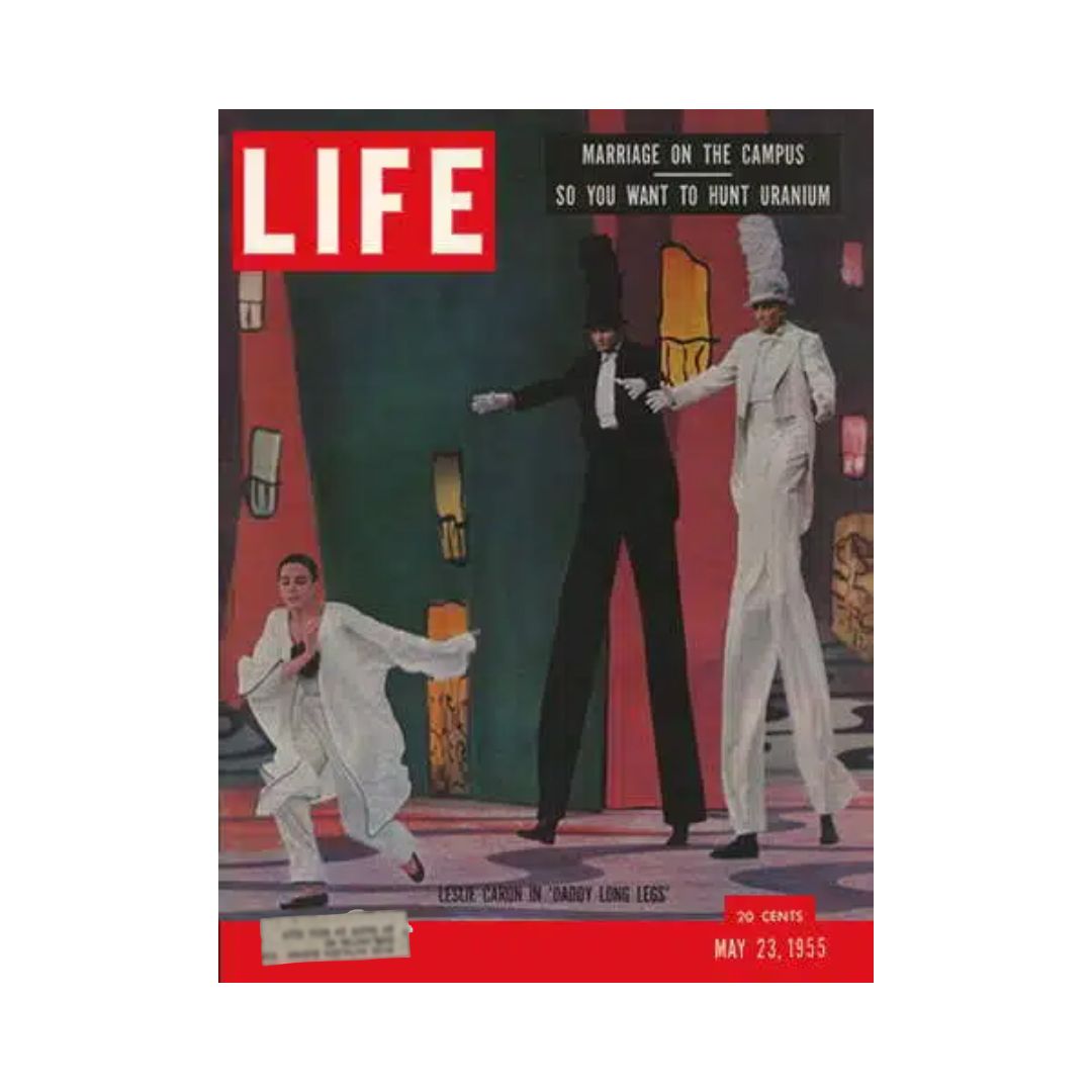 Cover of VTG Life Magazine from May 23, 1955 featuring Leslie Caron in 'Daddy Long Legs', showcasing a vibrant illustration with dancers and a bold red title.
