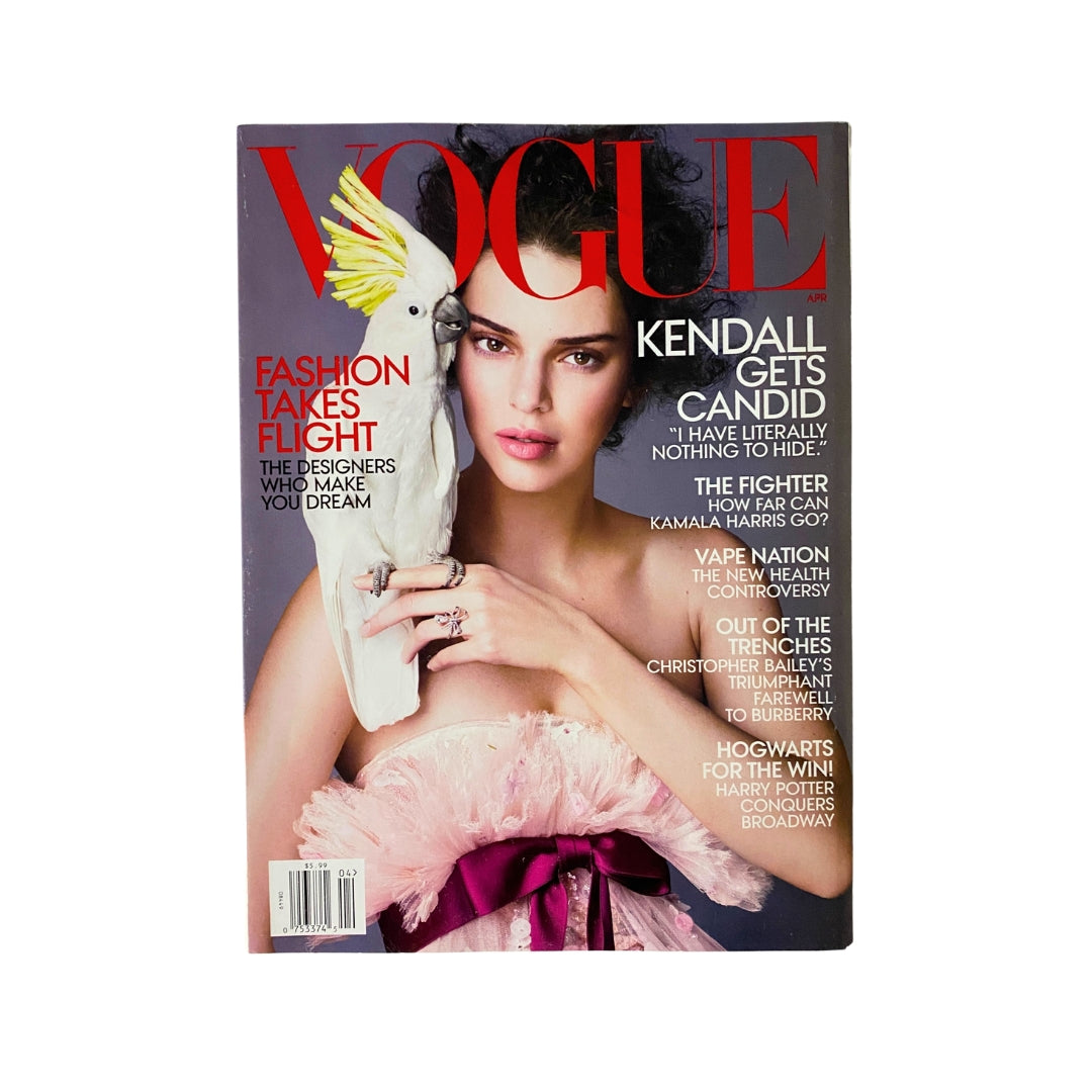 Vogue Magazine April 2018 cover featuring Kendall Jenner with a white cockatoo, reflecting vintage fashion and culture. This collectible issue showcases trending styles and captivates fashion enthusiasts.