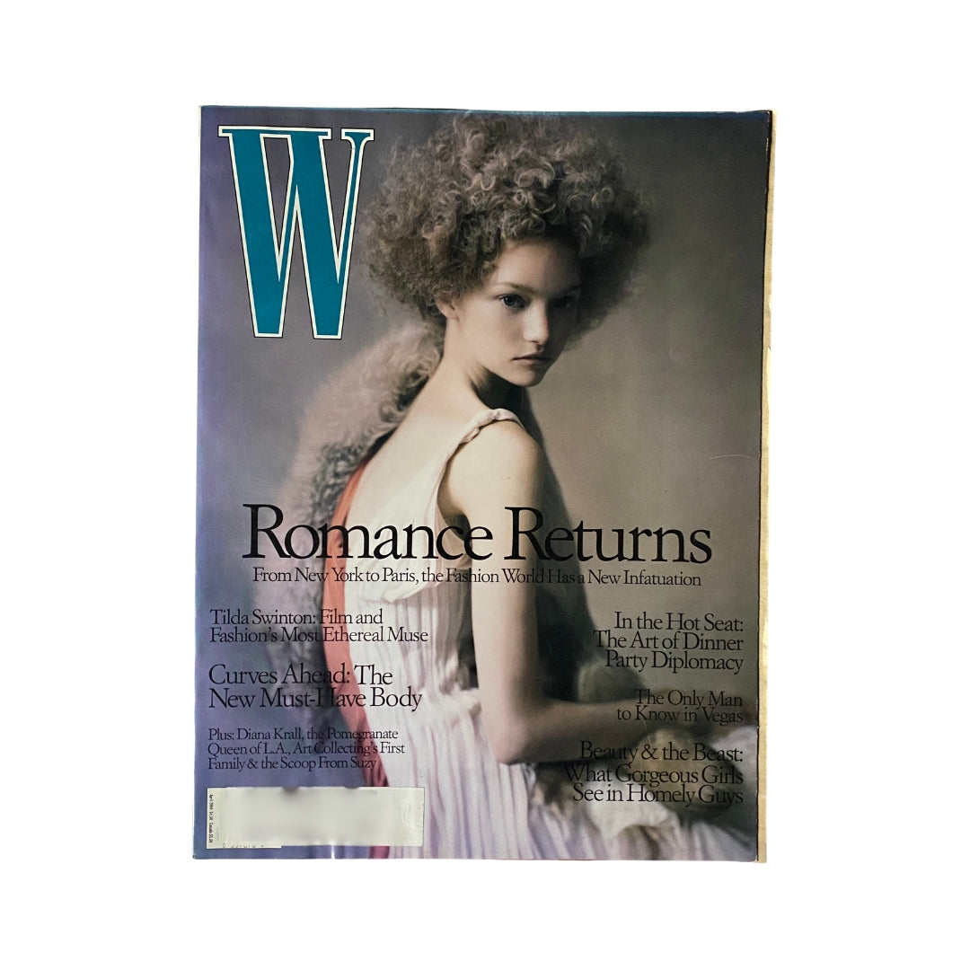 W Magazine April 2004 cover featuring Gemma Ward, highlighting fashion trends and culture of the early 2000s.