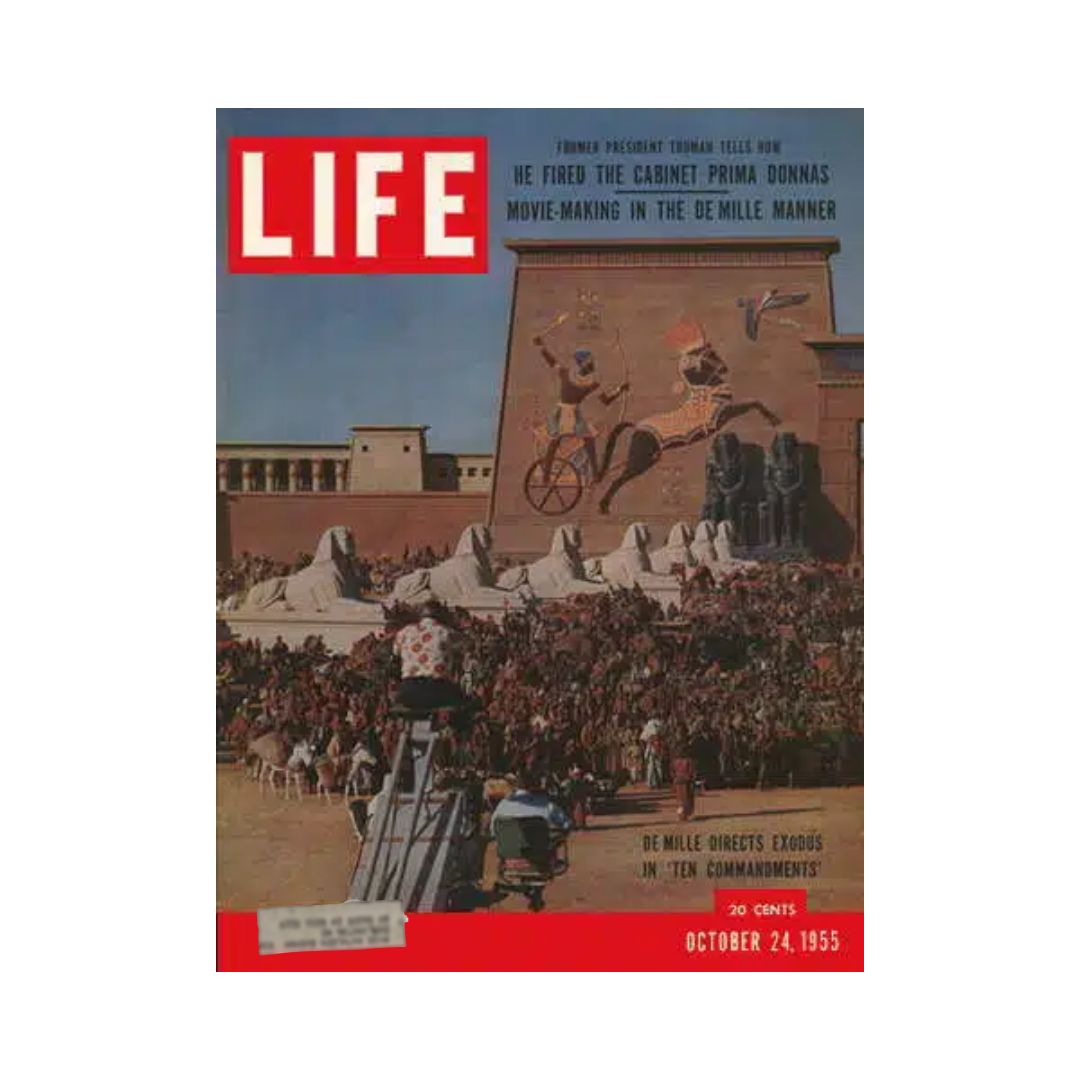 Front cover of Vintage Life Magazine, October 24, 1955, featuring Cecil B. DeMille's Ten Commandments movie, showcasing a large crowd at a film set with dramatic set design in the background.
