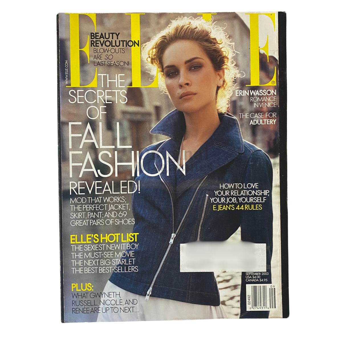 Elle Magazine September 2003 cover featuring Erin Wasson, showcasing 'The Secrets of Fall Fashion Revealed!' and highlighted content including '248 ELLE's Hot List' and 'The Case for Adultery.'