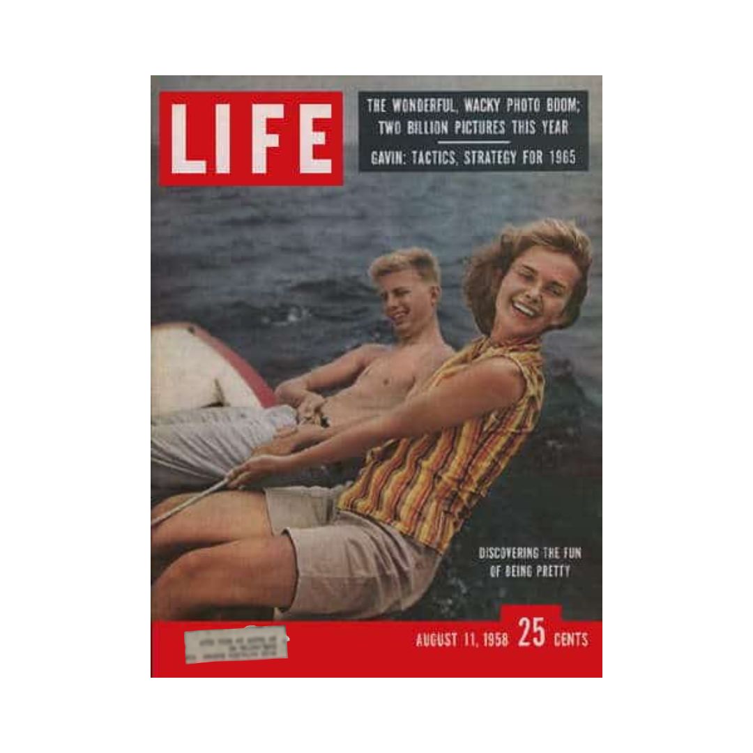 Cover of the VTG Life Magazine from August 11, 1958, titled 'Discovering the Fun of Being Pretty,' featuring a young woman and man enjoying a boat ride.