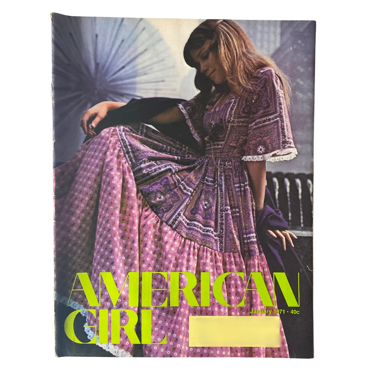 Cover of American Girl Magazine January 1971 featuring a young girl in a vintage purple dress with a floral pattern, capturing nostalgic fashion trends of the early 1970s.