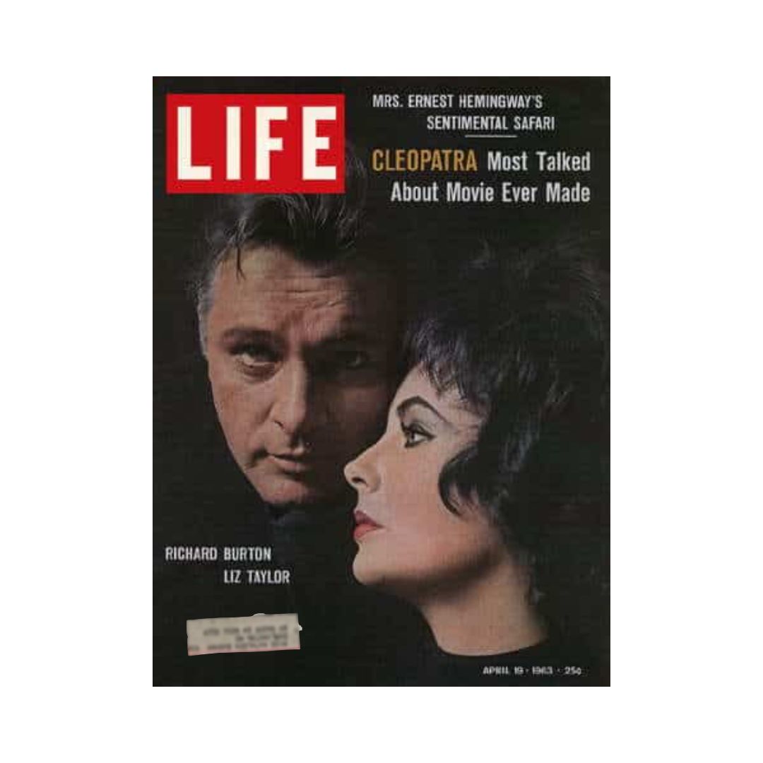 Cover of VTG Life Magazine from April 19, 1963 featuring Richard Burton and Elizabeth Taylor, highlighting the film Cleopatra, the most talked about movie ever made. The magazine includes promotional text and iconic images of the actors.