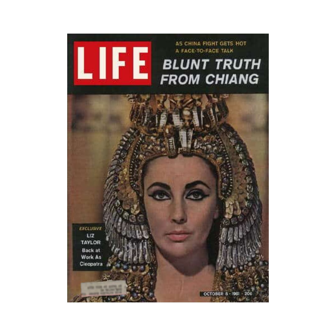 Vintage Life Magazine cover from October 6, 1961, featuring Elizabeth Taylor as Cleopatra, showcasing her iconic role in Hollywood's golden era.