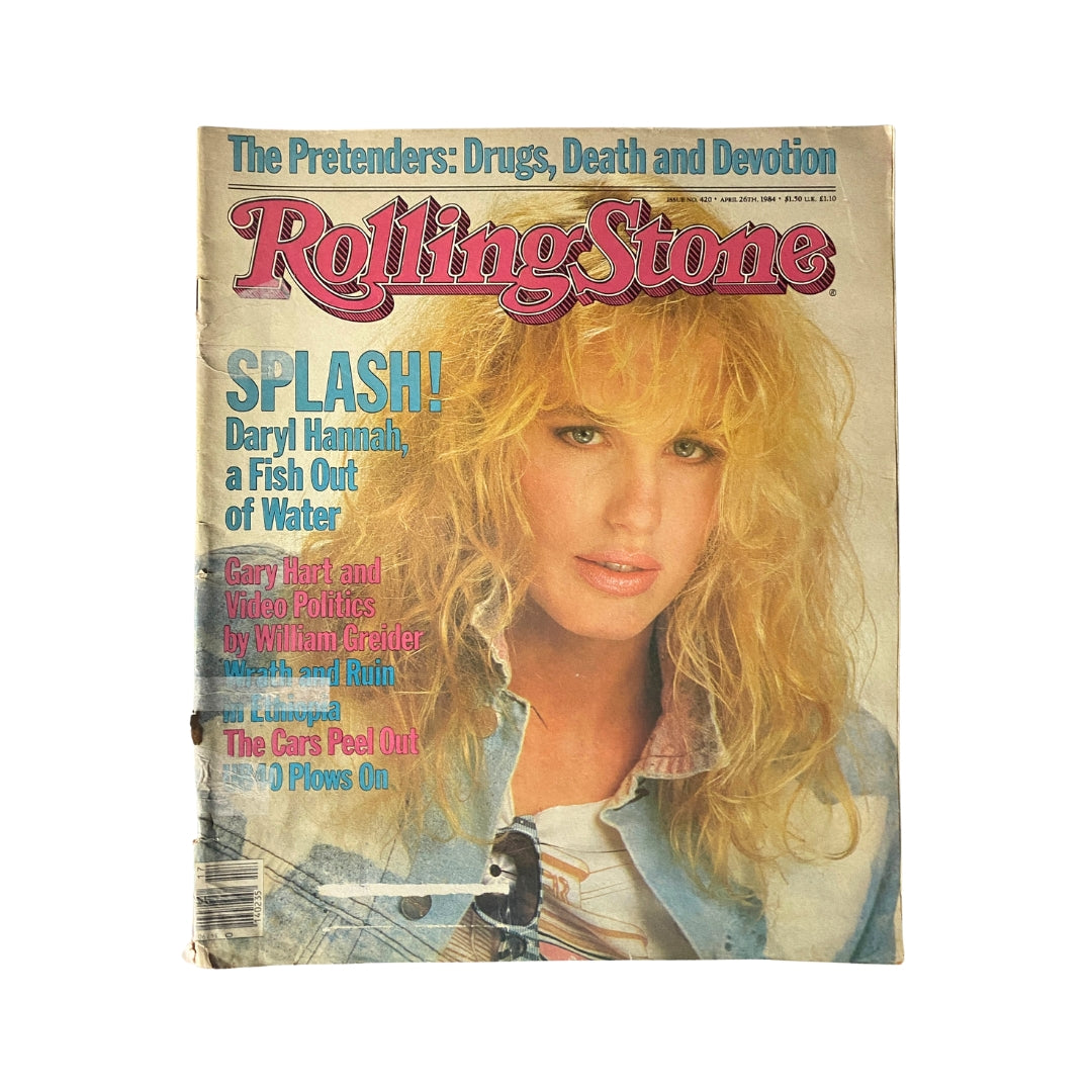 VTG Rolling Stone Magazine April 26, 1984 Issue 420 featuring a cover photo of Daryl Hannah with blonde curly hair, highlighting the title 'SPLASH! Daryl Hannah, a Fish Out of Water.' This vintage magazine captures the essence of the 1980s music and entertainment culture.