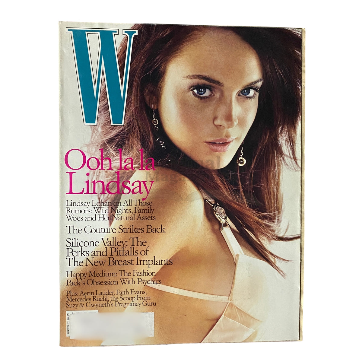 W Magazine April 2005 cover featuring actress and singer Lindsay Lohan, highlighting her captivating look with the title 'Ooh la la Lindsay'.
