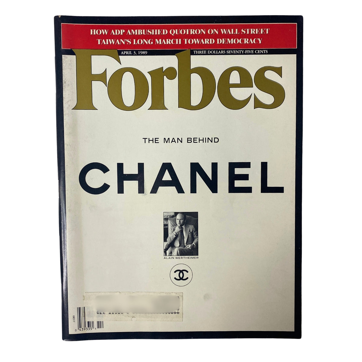 Forbes Magazine cover from April 3, 1989, featuring the title 'The Man Behind Chanel' with an image of Alain Wertheimer, highlighting the influence of Chanel and luxury branding.