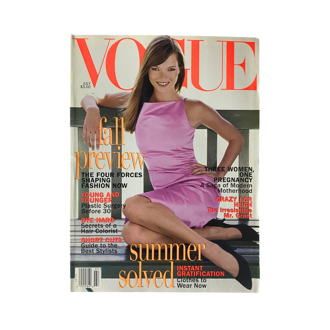 Vogue Magazine July 1995 featuring Kate Moss on the cover in a pink dress, highlighting fashion trends and cultural significance of the mid-90s.
