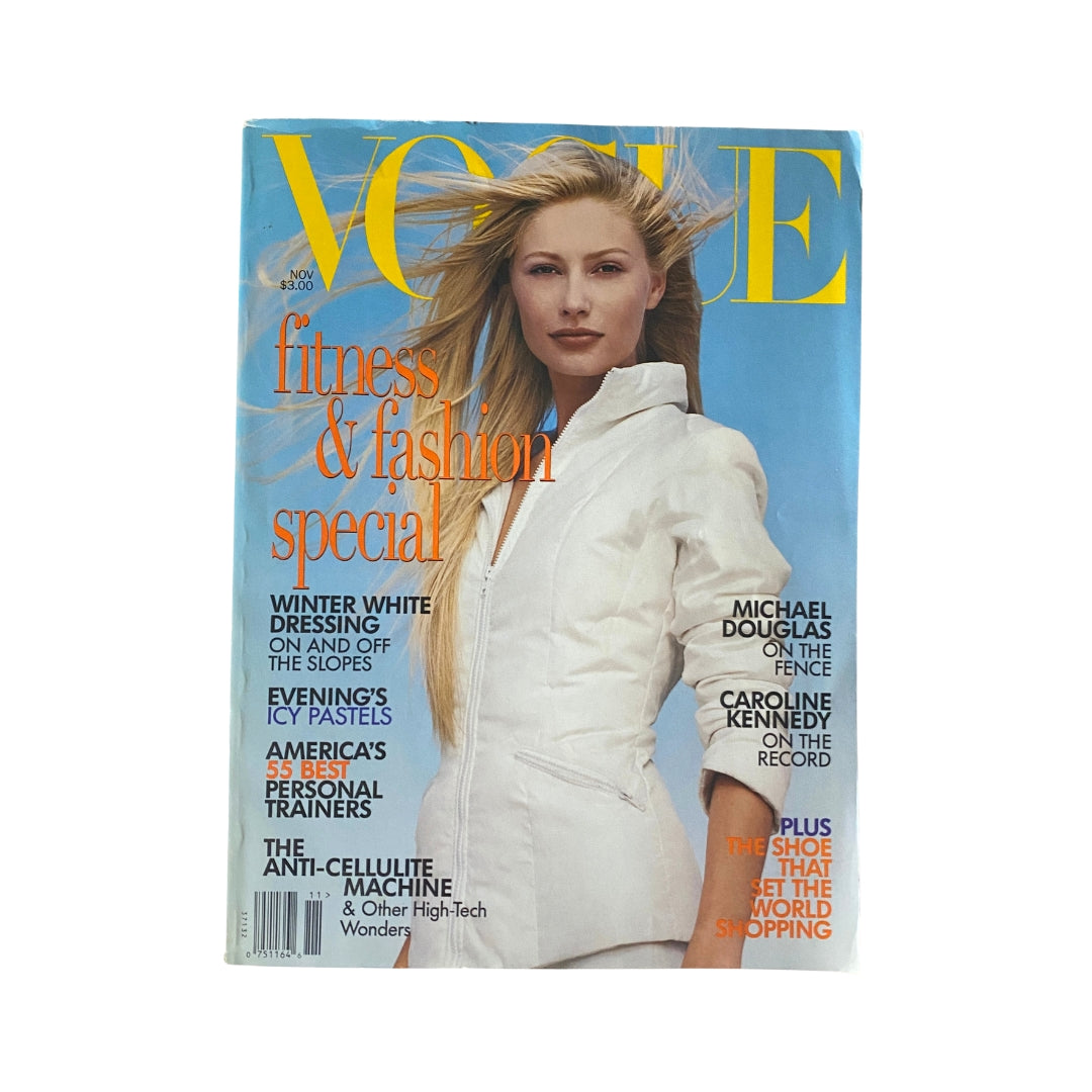 Vogue Magazine November 1995 cover featuring a model in a white athletic jacket, highlighting fitness and fashion special themes.