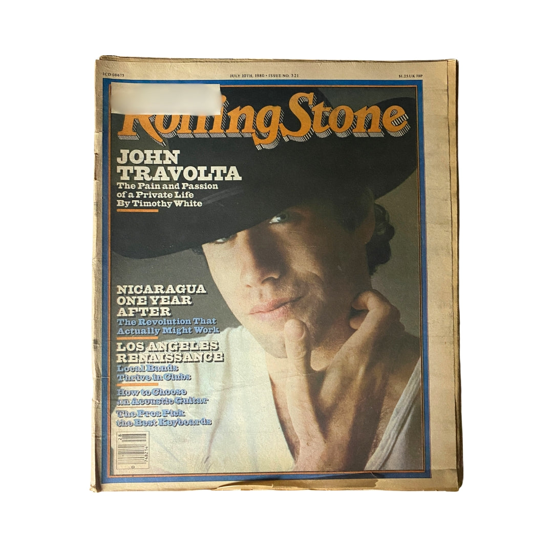 Vintage Rolling Stone Magazine, July 10, 1980 Issue 321 featuring John Travolta on the cover, showcasing pop culture of the late 1970s and early 1980s.