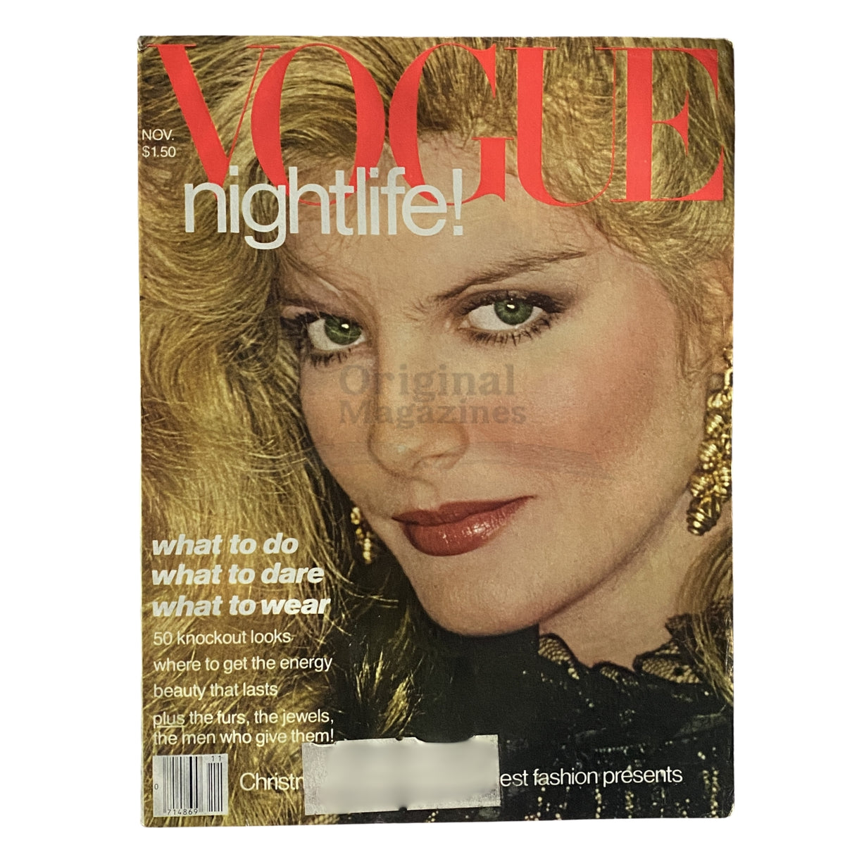 Vogue Magazine November 1977 cover featuring a striking blonde model with green eyes and bold makeup, highlighting the theme of nightlife.