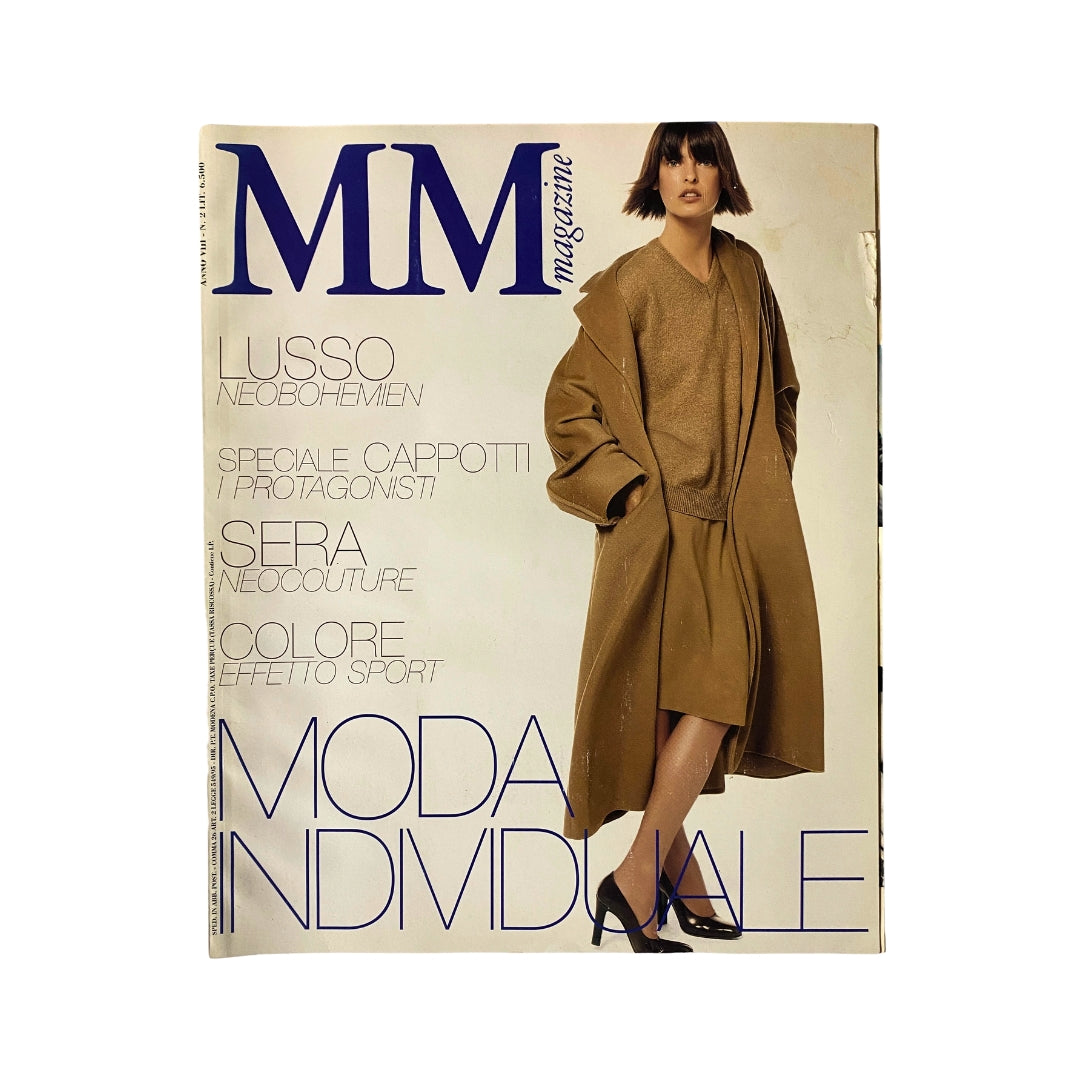 Cover of Max Mara Magazine 1997 featuring a model in chic fashion attire, highlighting 90s style trends. The magazine showcases prominent fashion features and beauty insights, making it a collectible piece for vintage fashion enthusiasts.