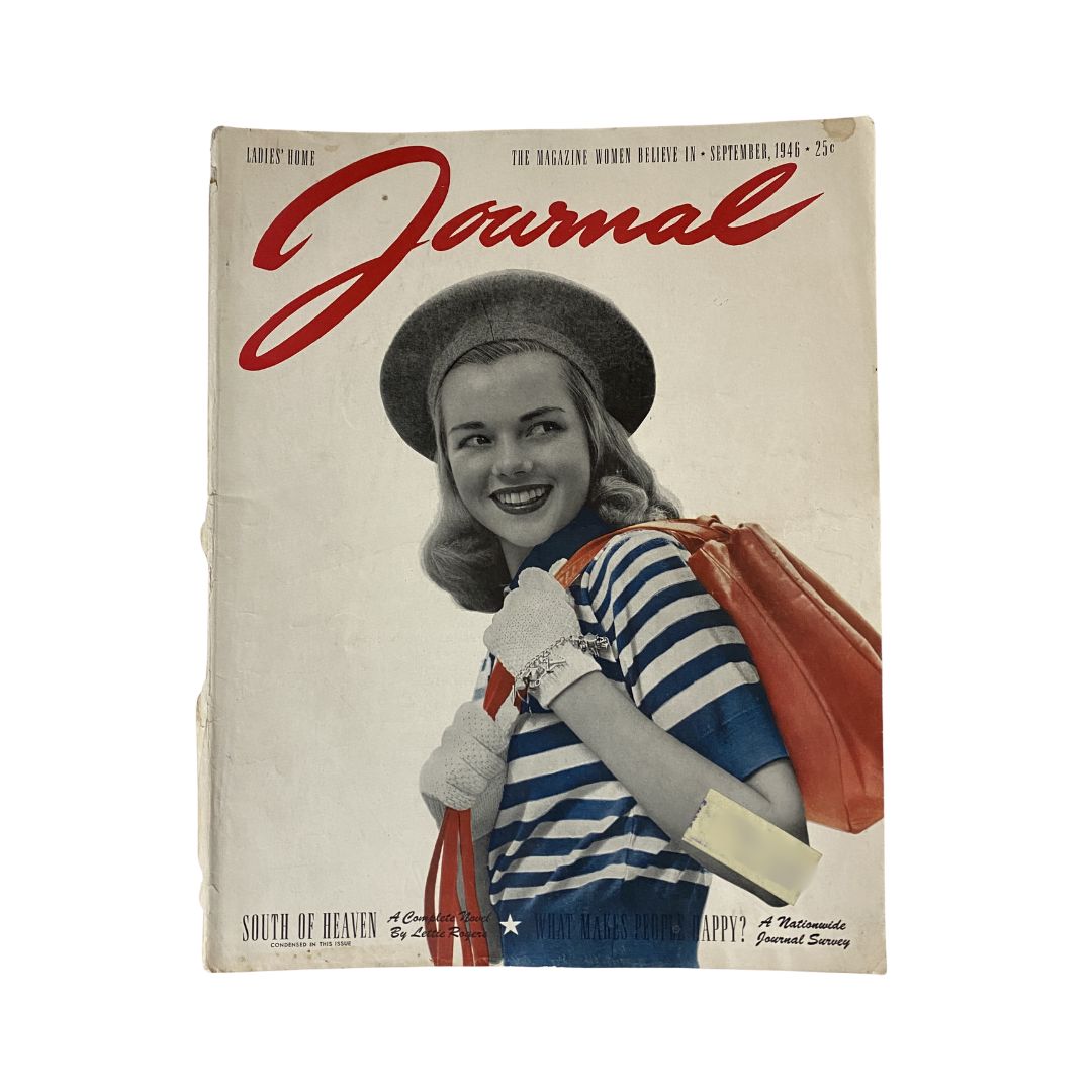 Ladies' Home Journal Magazine September 1946 cover featuring a smiling woman in a striped shirt and hat holding a red handbag, representing post-war American fashion trends.