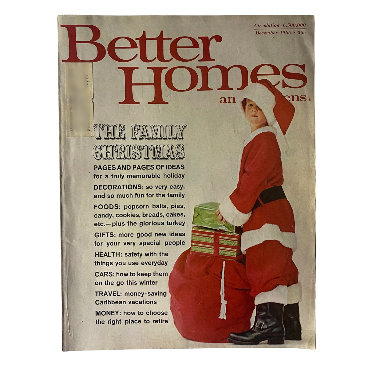 Cover of the December 1965 Better Homes & Gardens magazine titled 'The Family Christmas', featuring a young boy in a Santa outfit with a gift and holiday-themed graphics, capturing the essence of vintage Christmas traditions.