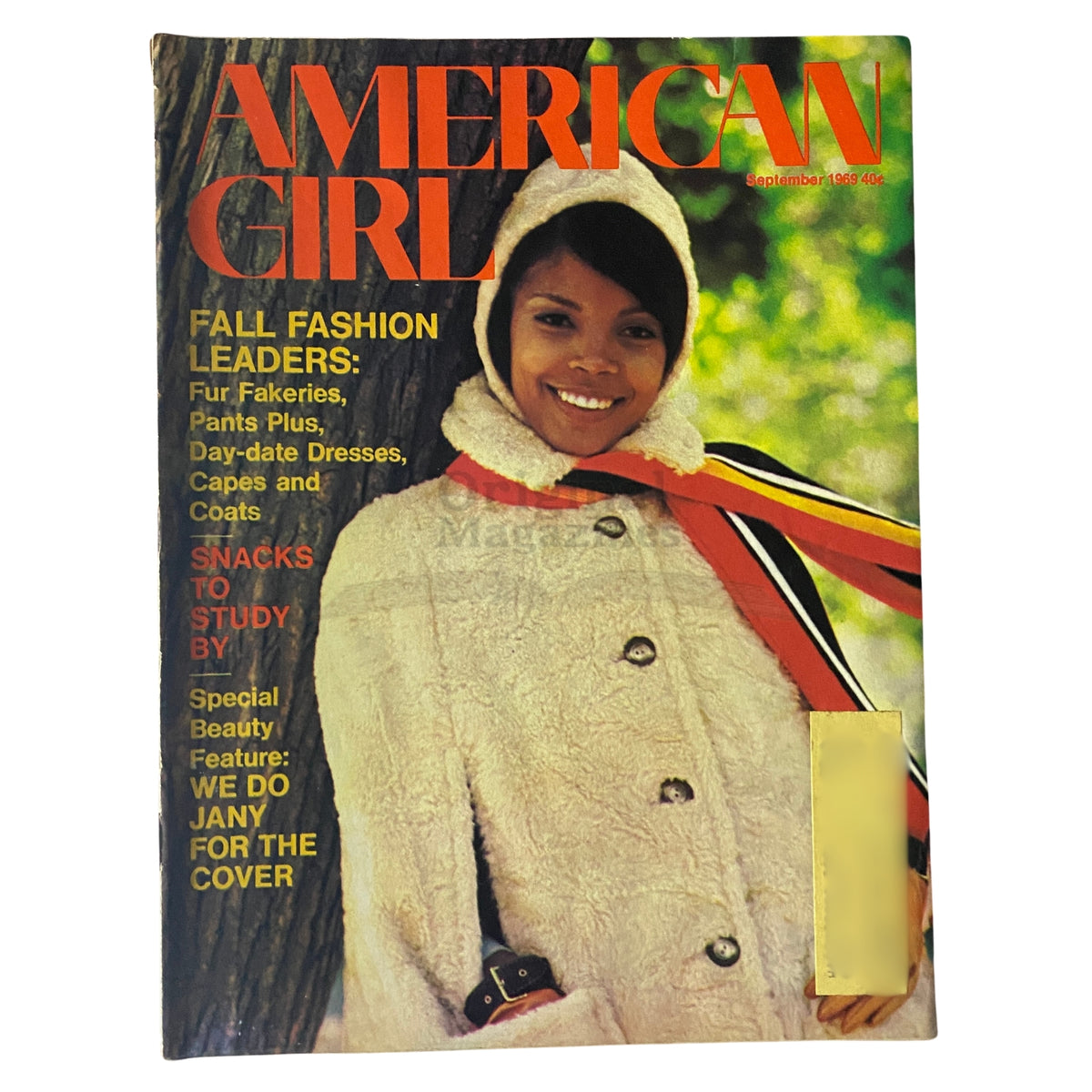 Cover of American Girl Magazine September 1969 edition featuring Fall Fashion Leaders including fur fakeries, showcasing a young female model wearing a stylish coat in a natural setting.