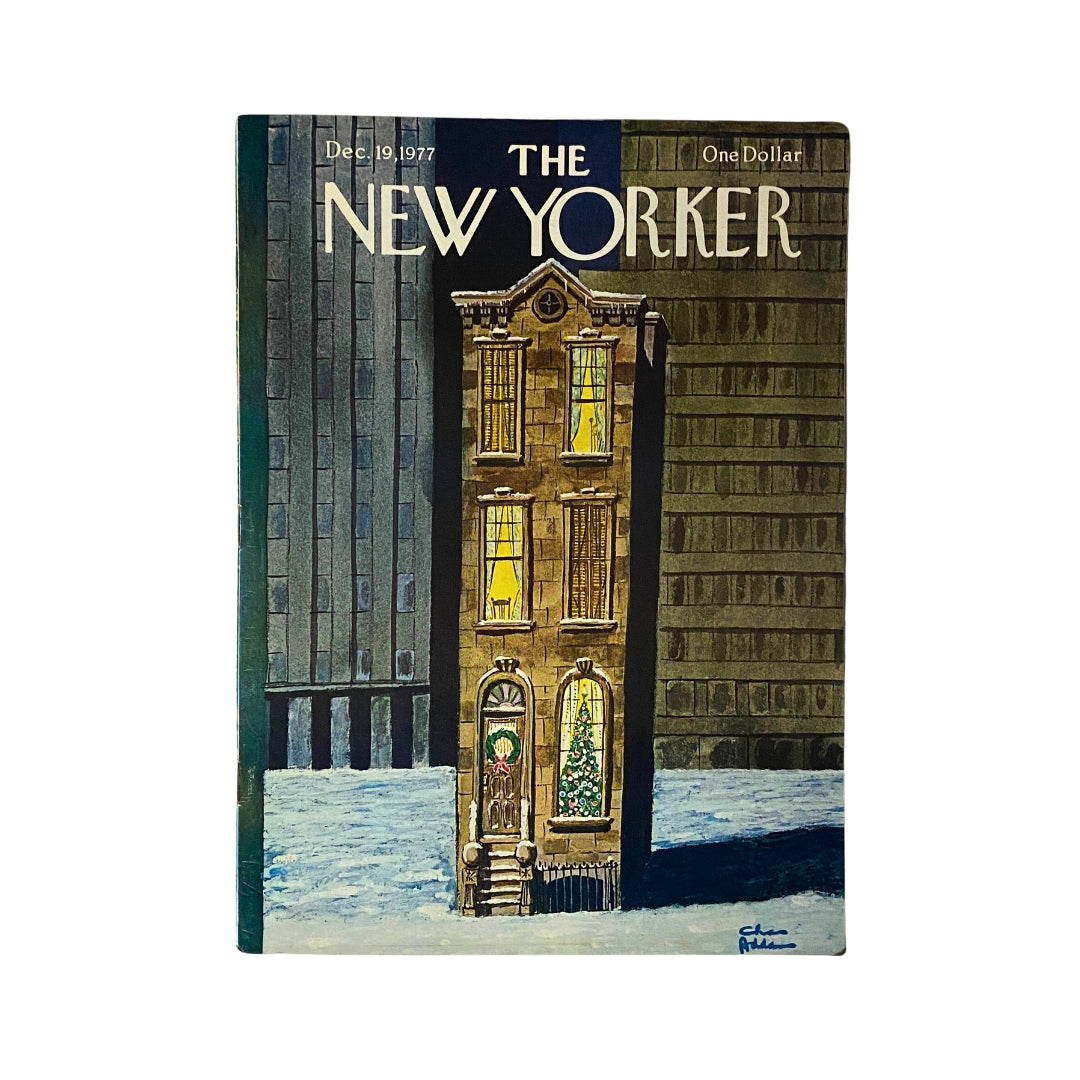 Cover of The New Yorker Complete Magazine, December 19, 1977, featuring Chas Addams artwork and showcasing a whimsical illustration of a building with holiday decorations.