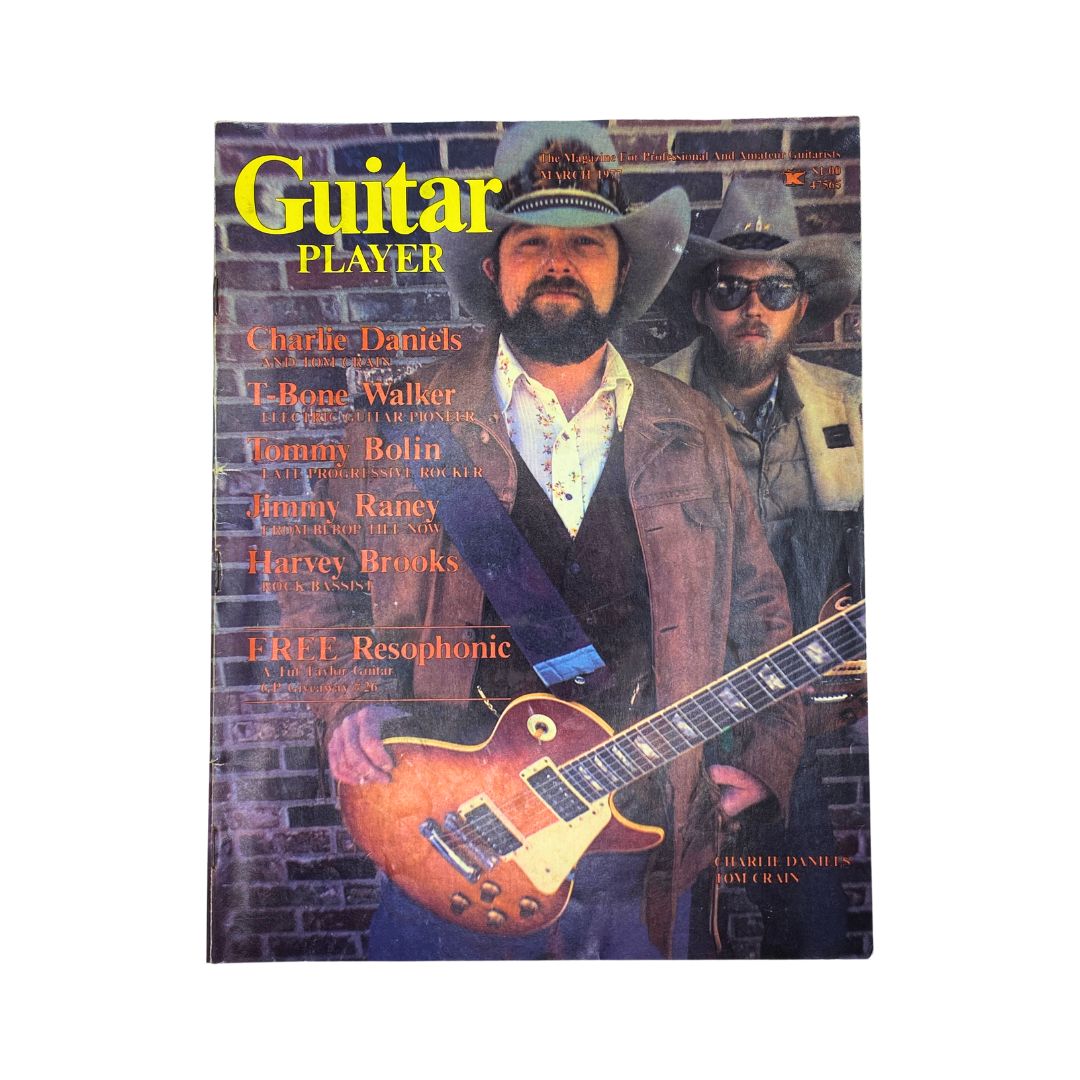 Cover of VTG Guitar Player Magazine March 1977 featuring Charlie Daniels and Tom Crain, showcasing a vintage aesthetic with notable musicians and relevant articles on country music.