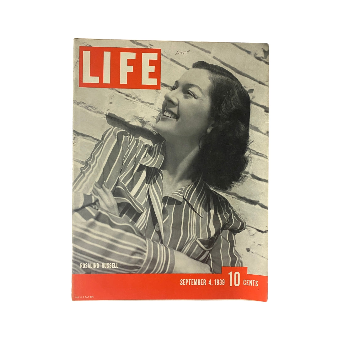 Cover of Life Magazine September 4, 1939 featuring Rosalind Russell, showcasing a portrait of the actress with a bright red LIFE logo, capturing the essence of pre-war America.