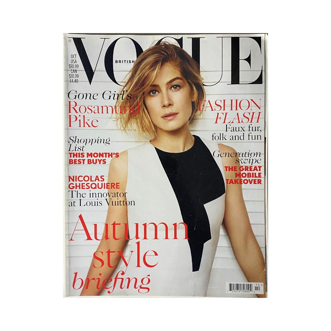 Vogue UK Magazine October 2014 featuring Rosamund Pike on the cover, showcasing autumn fashion style and highlights from the issue.