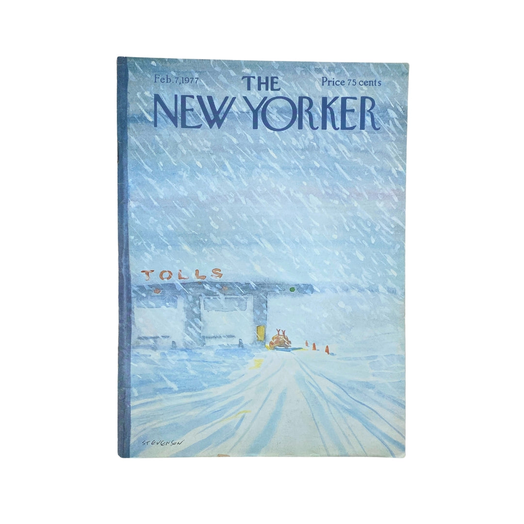 The New Yorker Complete Magazine February 7, 1977 featuring a cover illustration by James Stevenson depicting a snowy scene with a toll booth. This vintage magazine offers a glimpse into American culture of the late 1970s.