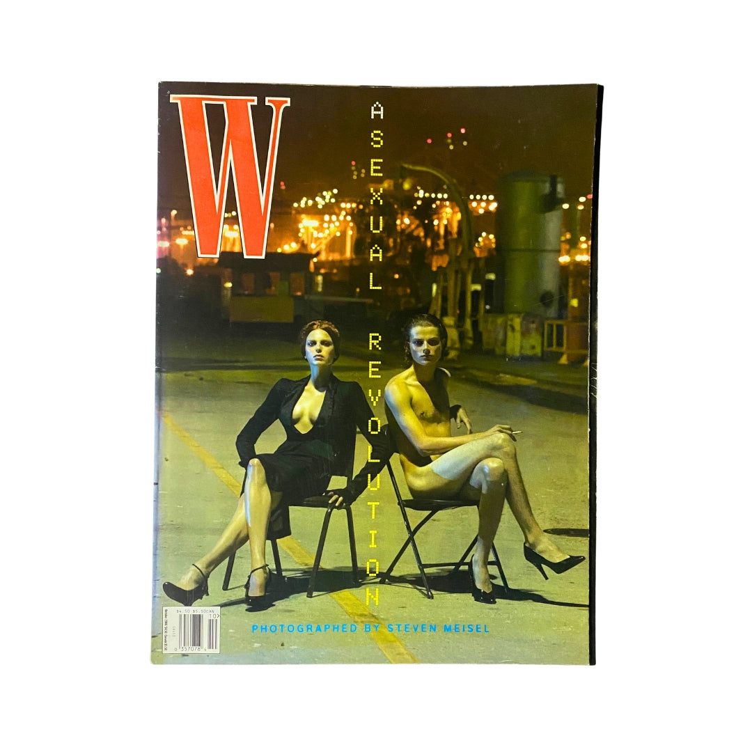 W Magazine October 2004 cover featuring a striking fashion photograph by Steven Meisel, showcasing two models in stylish outfits against an urban backdrop, representing the Asexual Revolution theme.