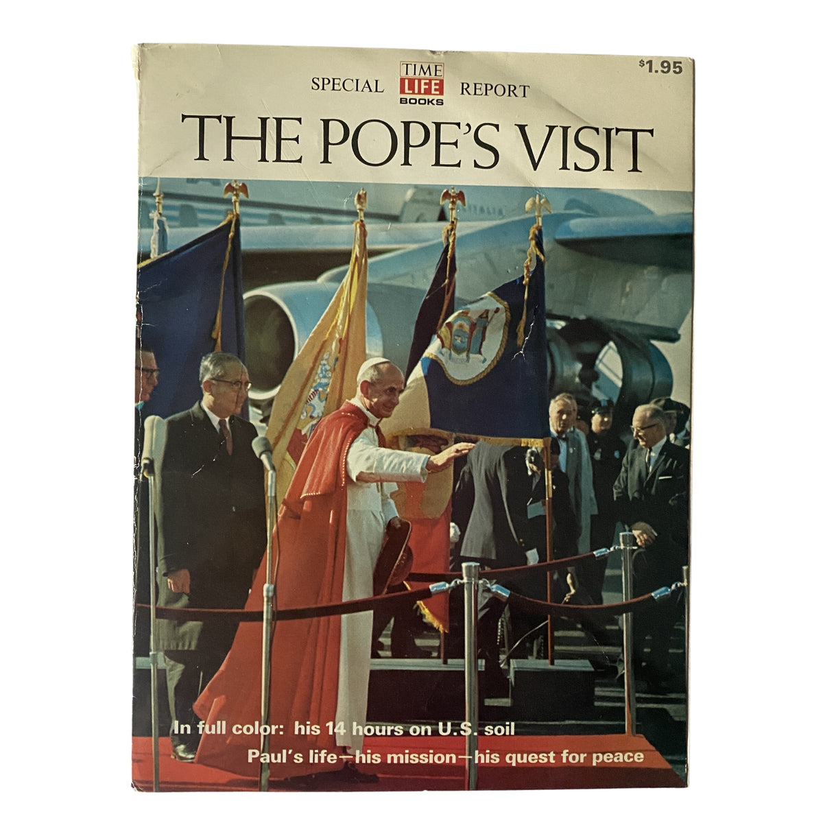 Cover of the 1965 Time Life Special Report: The Pope's Visit featuring Pope Paul VI arriving on U.S. soil, surrounded by officials and flags, highlighting his mission for peace.