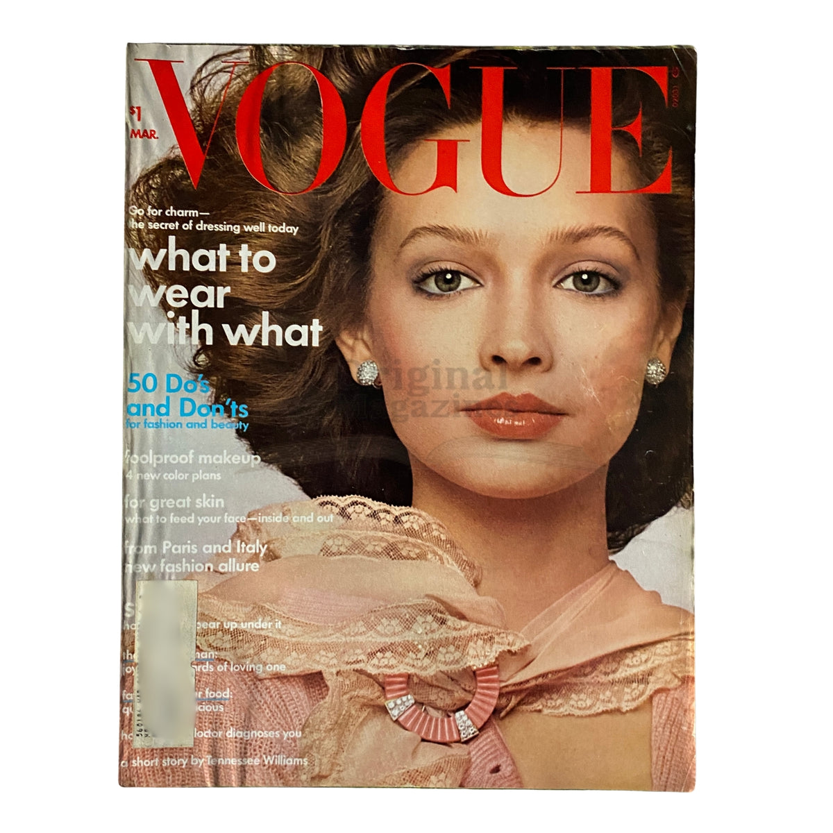 Cover of Vogue Magazine March 1974 featuring model Paula Klimak by Francesco Scavullo, showcasing vintage fashion and beauty trends.