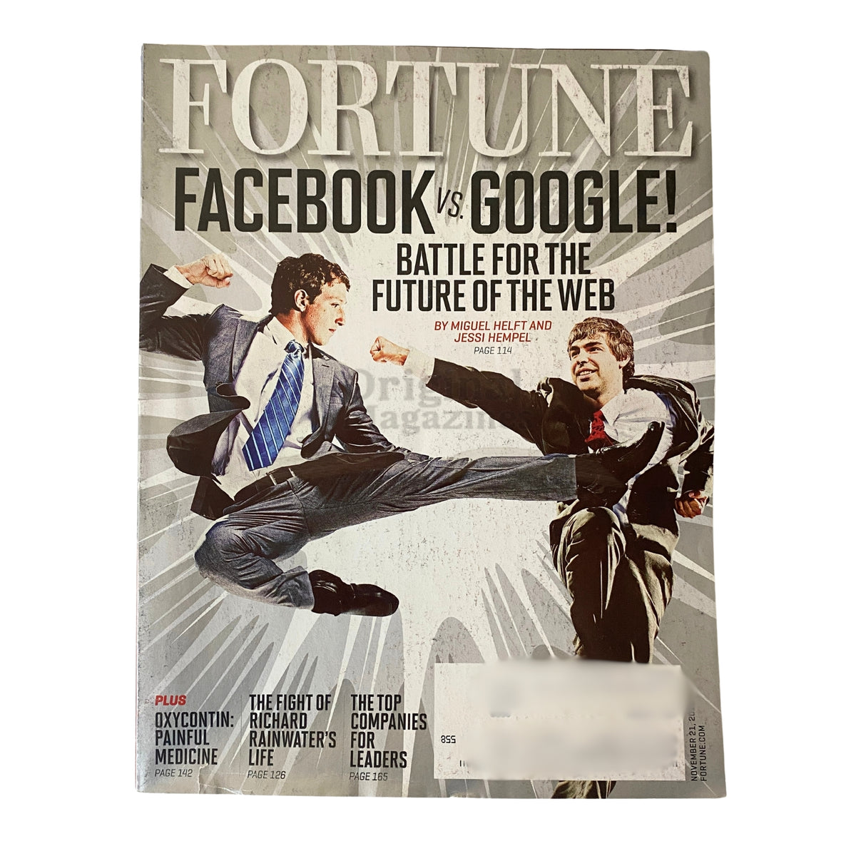 Cover of Fortune Magazine from November 21, 2011, featuring the title 'Facebook vs. Google: Battle for the Future of the Web'. This issue highlights a face-off between Mark Zuckerberg and Larry Page, providing insights into the competitive tech landscape.